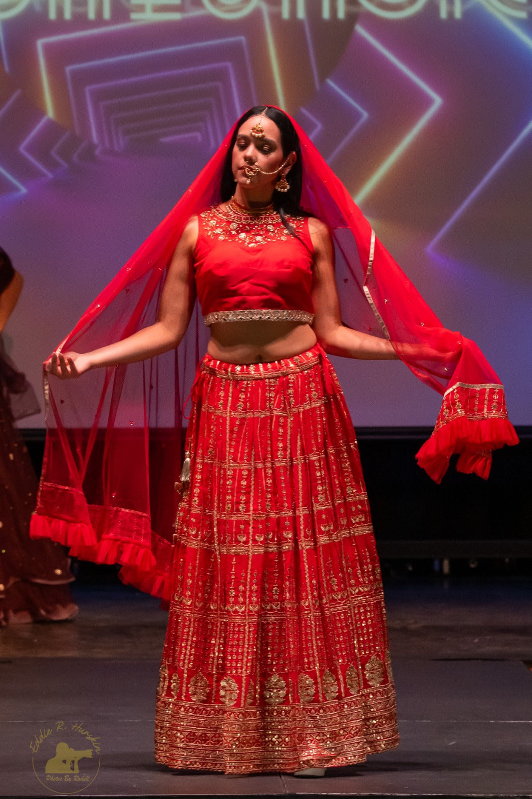 Red Georgette lehenga highlighted with Gold zari and pearl, Cutdana work