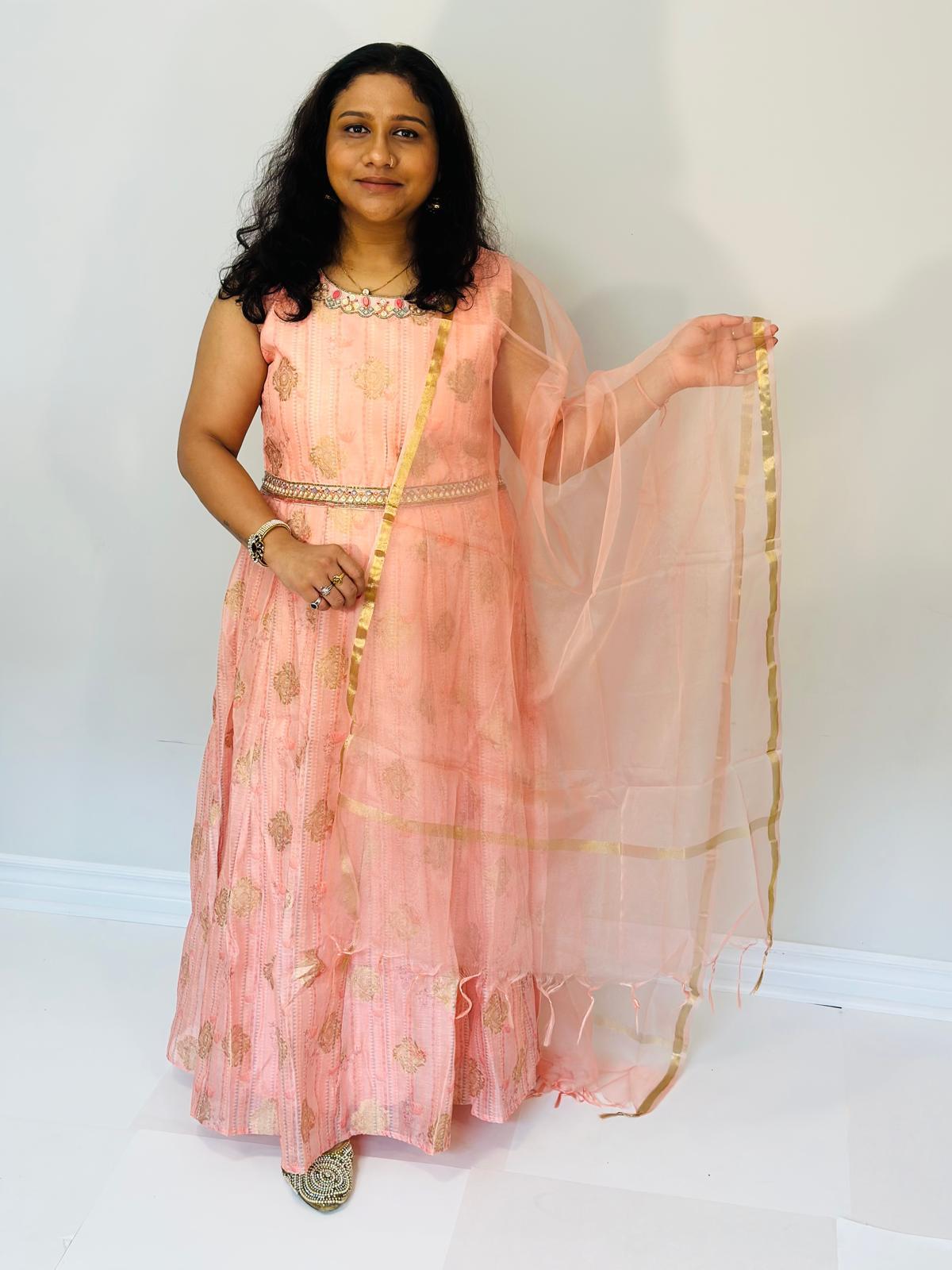 Peach Banarasi silk suit highlighted with pearl, Cutdana & thread hand work