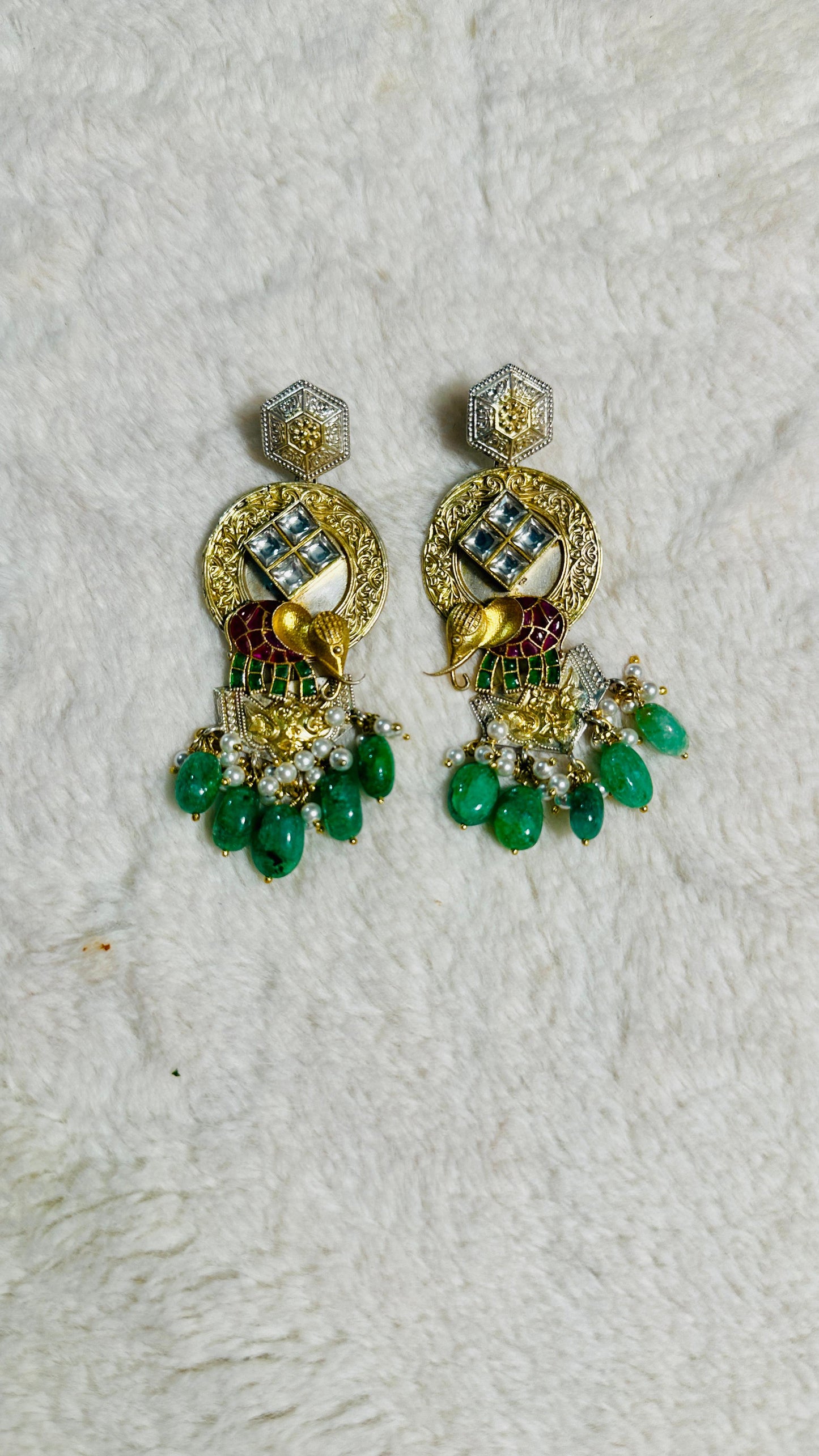 Pure 92.5 Silver Dual tone Elephant Earrings embellished with Emerald green beads along with Fresh water pearls.