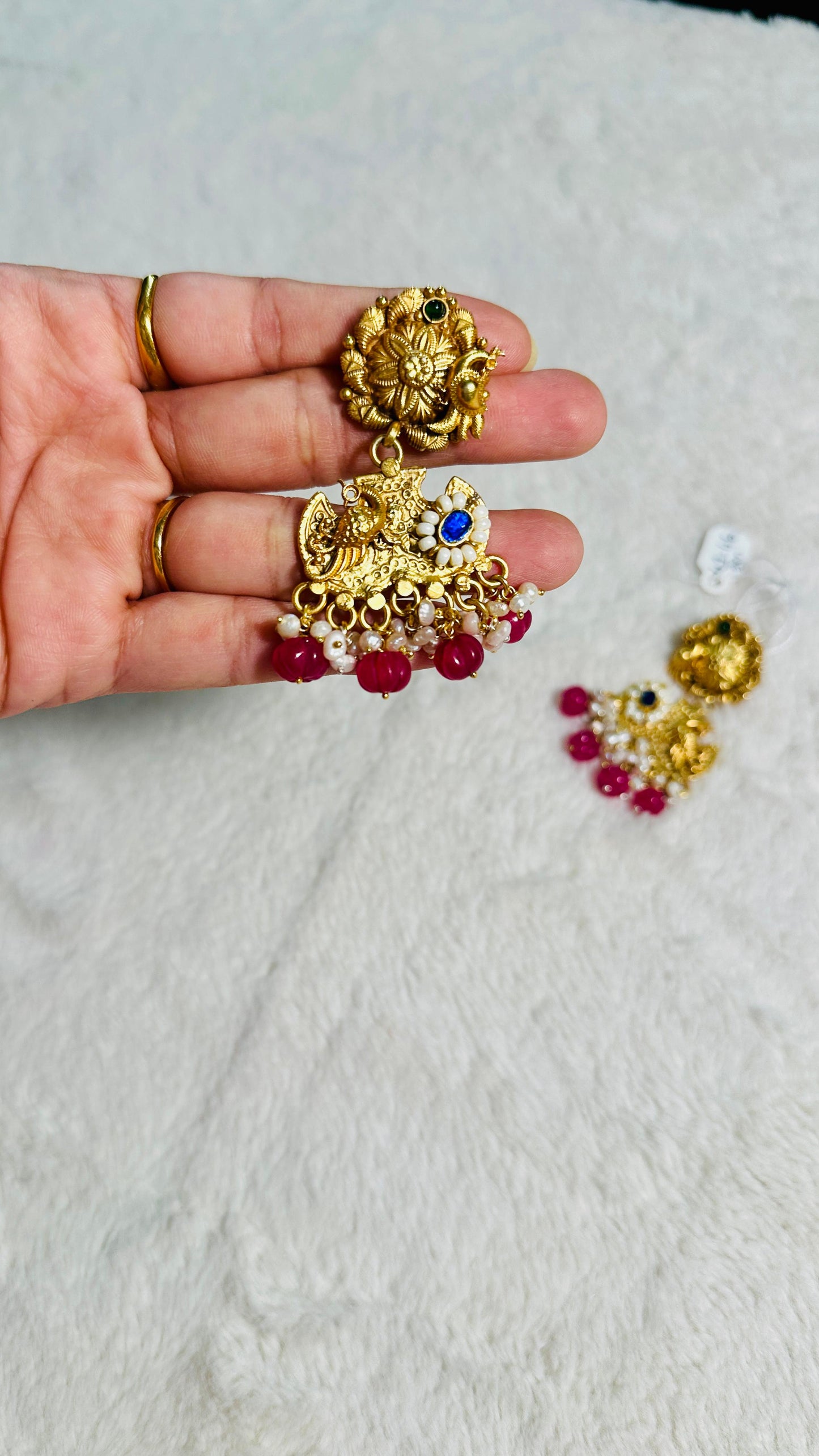 Pure 92.5 Silver Gold tone Peacock Earrings embellished with semiprecious Ruby beads & Blue lapis stone along with Fresh water pearls.