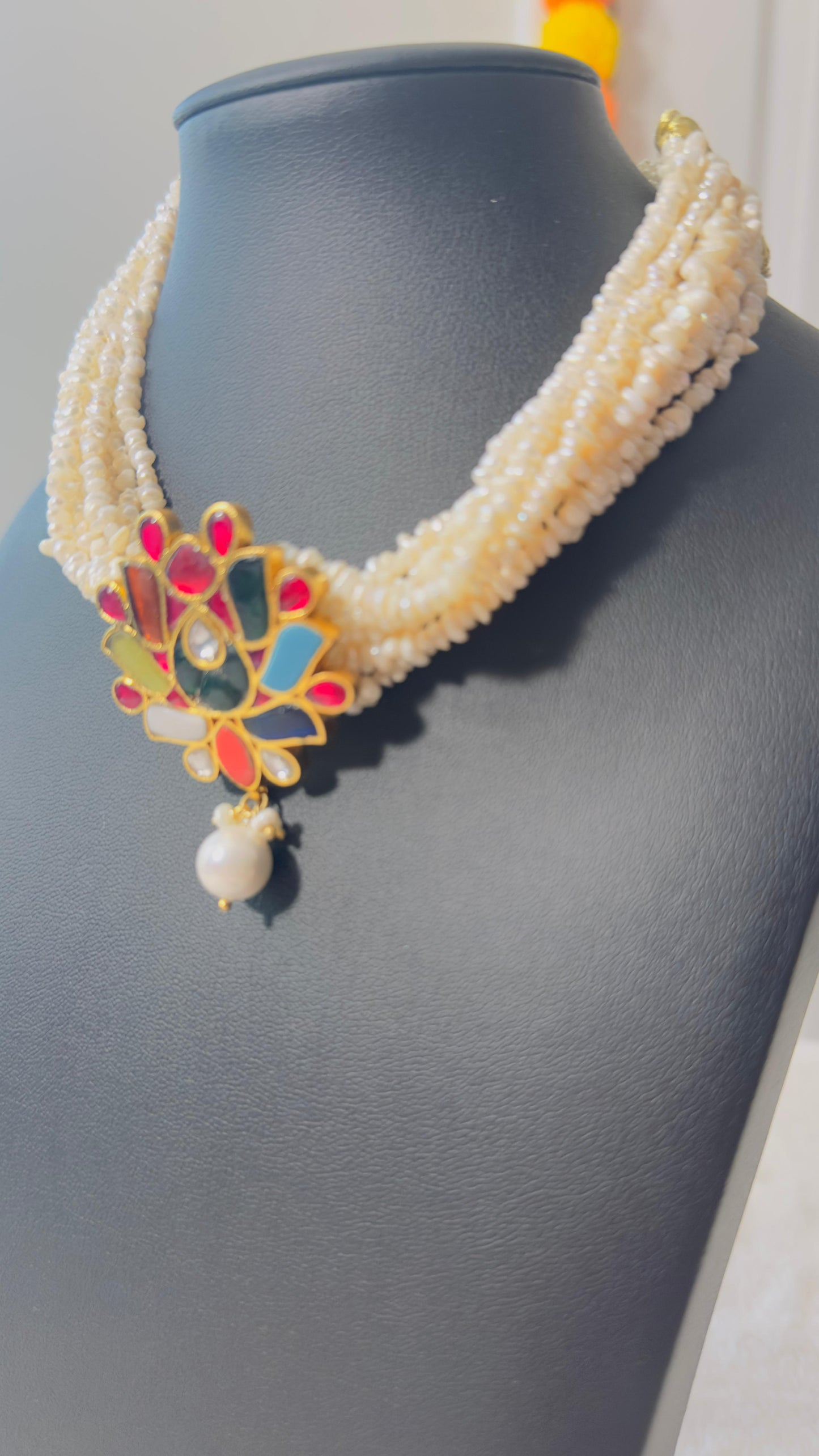 Pure 92.5 Silver Navratan pendant fresh water pearl choker embellishment with navratan semiprecious multicoloured gemstone.