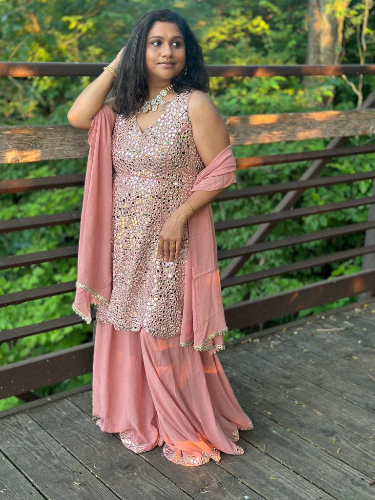 Salmon pink designer Sharara set highlighted with real mirror, pearl handwork