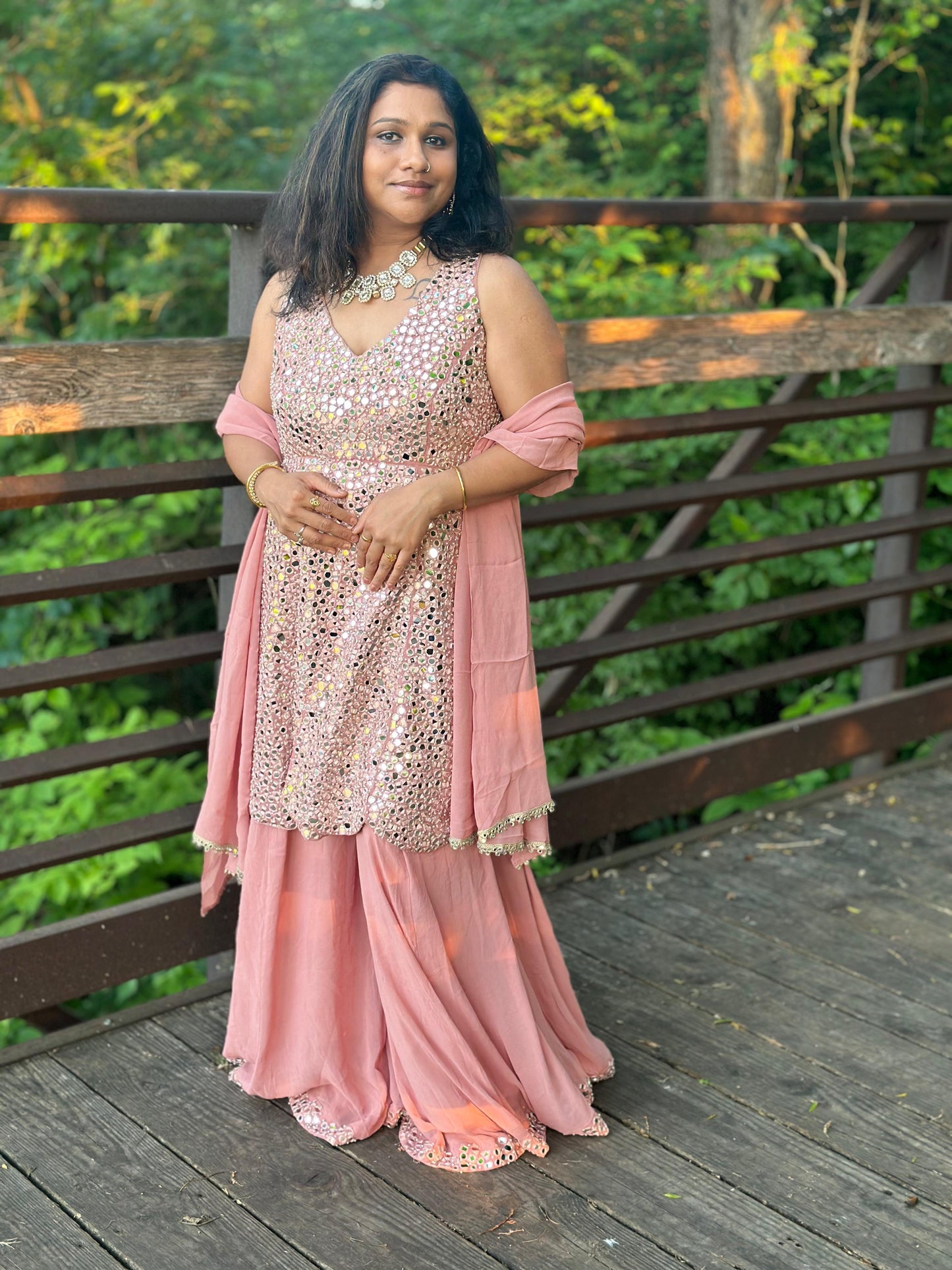 Salmon pink designer Sharara set highlighted with real mirror, pearl handwork