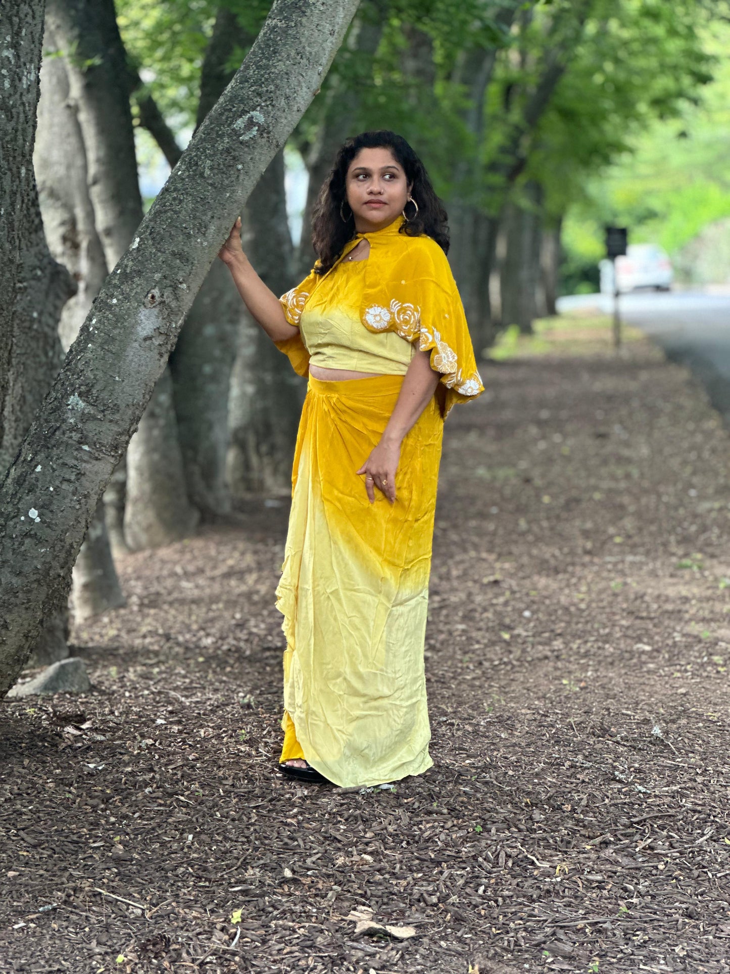 Sunshine yellow designer Indowestern skirt set highlighted with sequins & pearl handwork