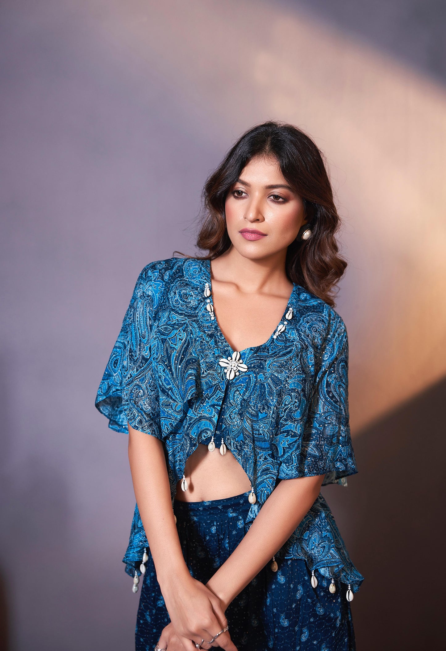 Teal Blue designer Indowestern palazzo set highlighted with stone & shell handwork