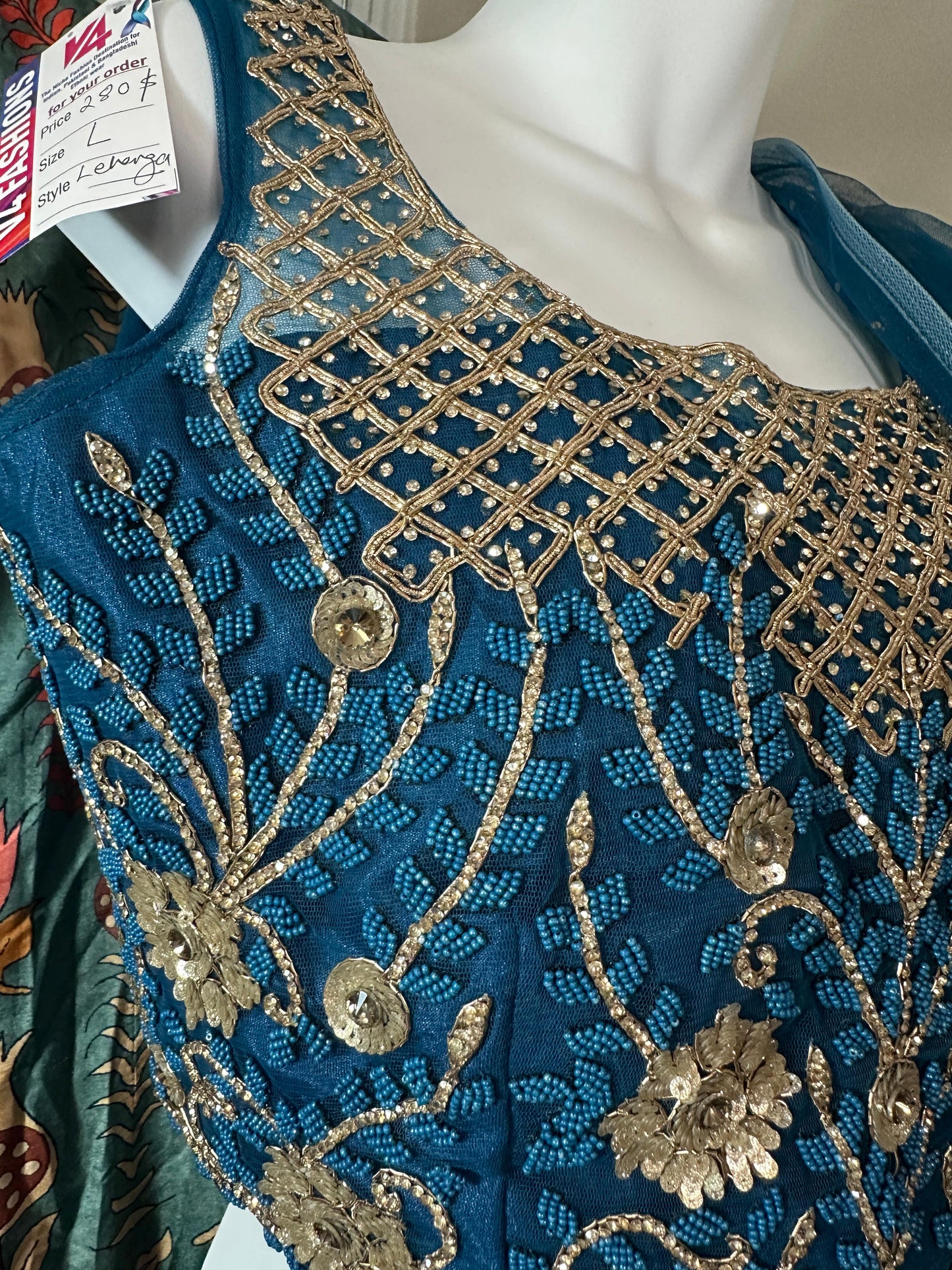 Teal Blue designer Lehenga highlighted with all Pearl & semiprecious stone, Cutdana, sequins handwork