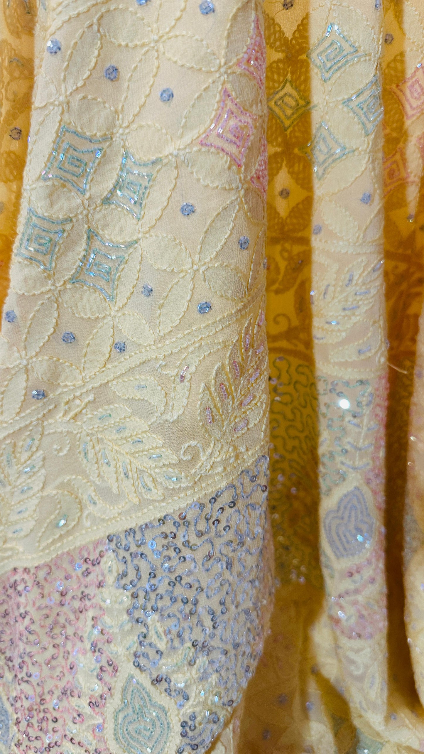 Lime yellow Pure Georgette Chikankari Saree enteric with fine Chikankari,Cutdana & Ring Mukaish hand embroidery