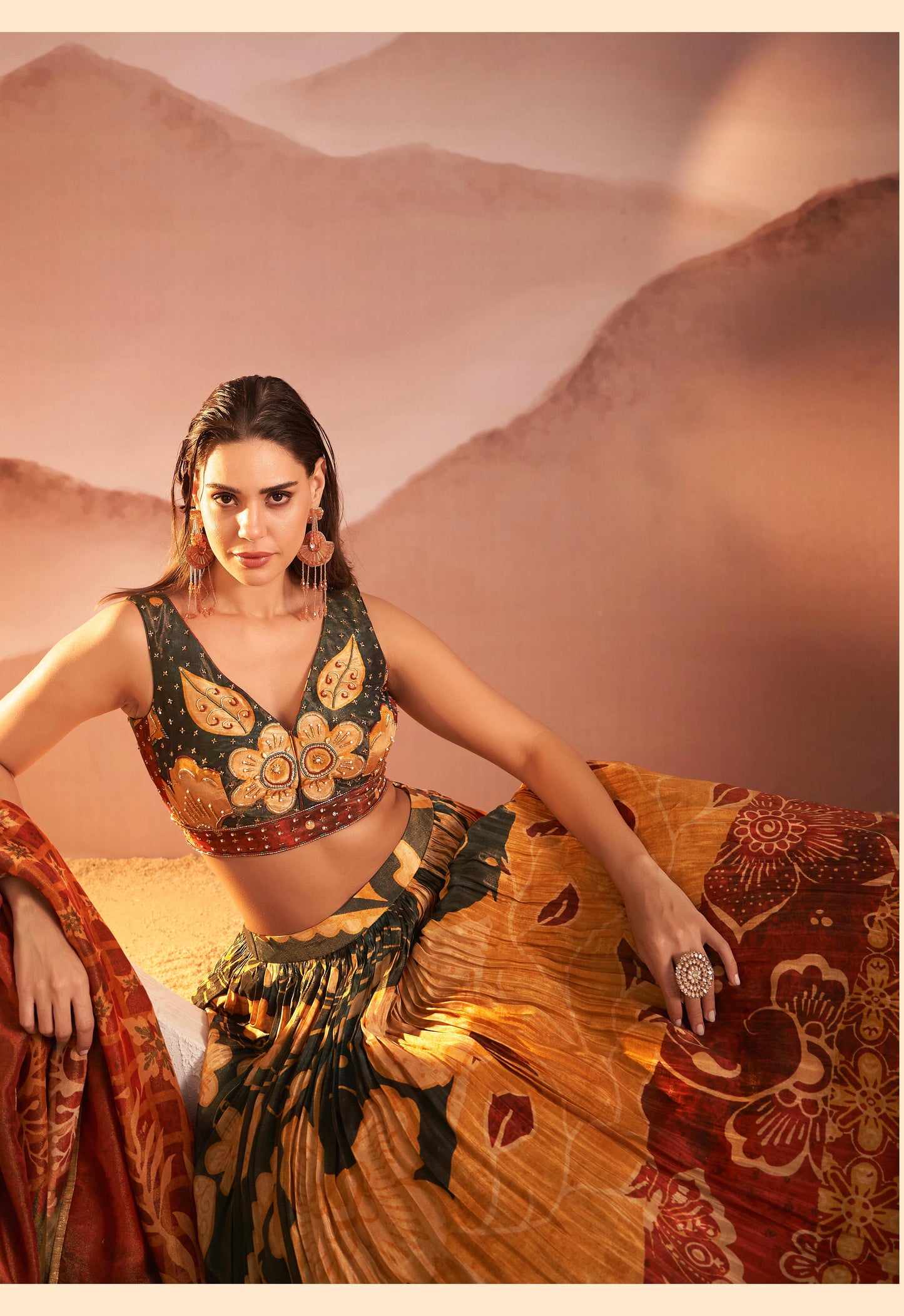 Yellow designer floral Lehenga with Duppata highlighted with all Cutdana, pearl handwork