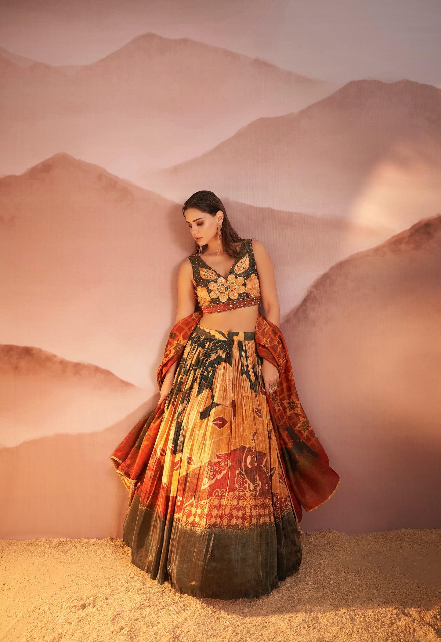 Yellow designer floral Lehenga with Duppata highlighted with all Cutdana, pearl handwork