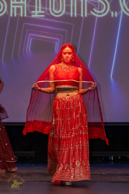 Red Georgette lehenga highlighted with Gold zari and pearl, Cutdana work