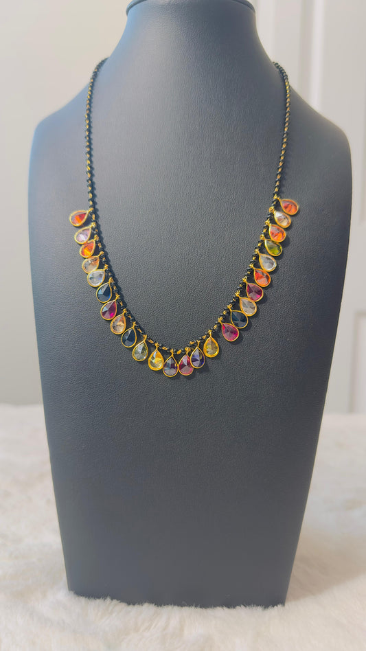 Pure 92.5 Silver Navratan Mangalsutra embellishment with black beads and semiprecious multicoloured gemstone.