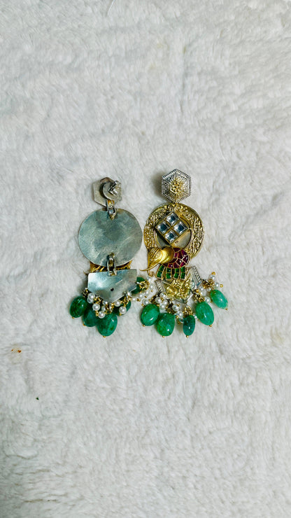 Pure 92.5 Silver Dual tone Elephant Earrings embellished with Emerald green beads along with Fresh water pearls.