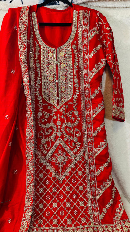Red CHINON silk suit highlighted with pearl, Cutdana, Mirror& thread hand work