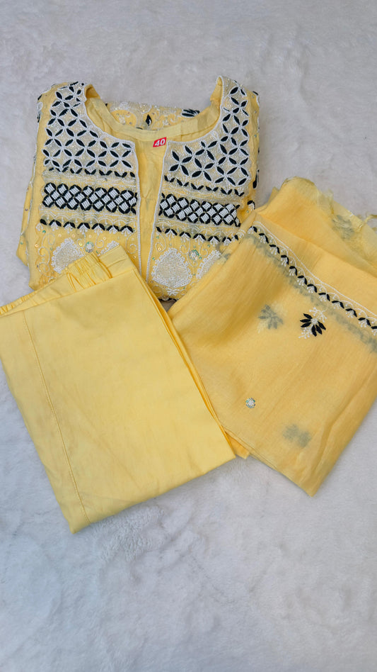 Soft lime yellow pure Mulmul Chikankari gown suit highlighted with hand chikankari, pearl & Cutdana