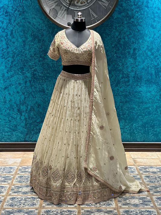 Beige Designer Tissue silk Lehenga highlighted with pearl, Cutdana, Jardosi handwork - My Store