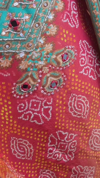 Orange Bandhani print Chinon silk suit highlighted with pearl, Cutdana & thread hand work