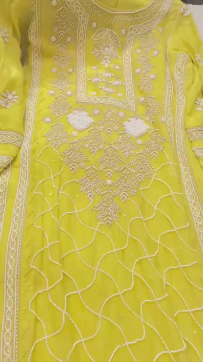 Lime yellow pure Mulmul Pearl suit highlighted with and pearl & Cutdana handwork