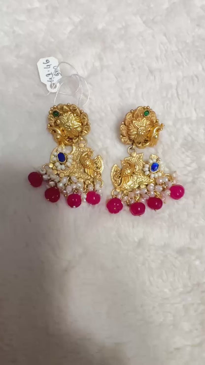 Pure 92.5 Silver Gold tone Peacock Earrings embellished with semiprecious Ruby beads & Blue lapis stone along with Fresh water pearls.