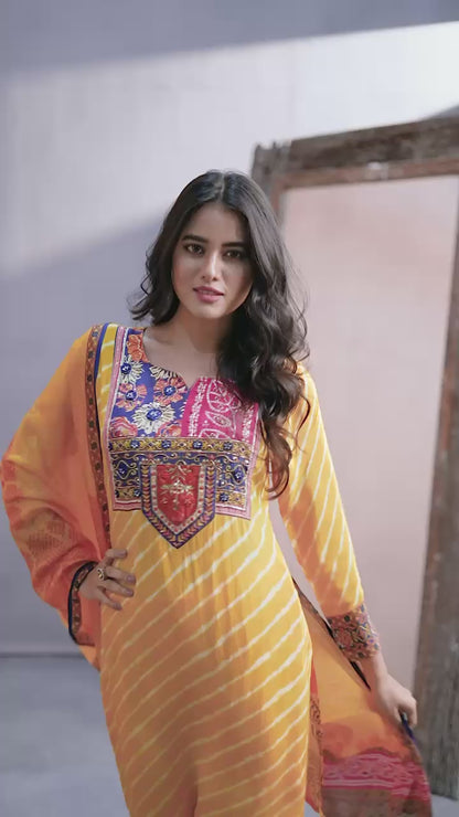 Yellow lehriya print crape silk suit highlighted with pearl, Cutdana & thread hand work