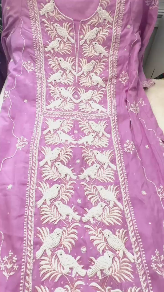 Lilac pure Mulmul Chikankari suit highlighted with hand chikankari and pearl handwork