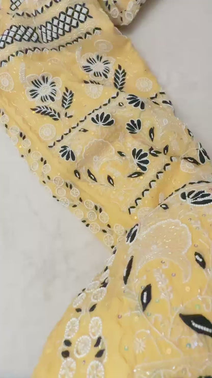 Soft lime yellow pure Mulmul Chikankari gown suit highlighted with hand chikankari, pearl & Cutdana
