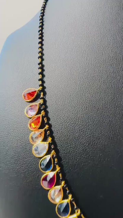 Pure 92.5 Silver Navratan Mangalsutra embellishment with black beads and semiprecious multicoloured gemstone.