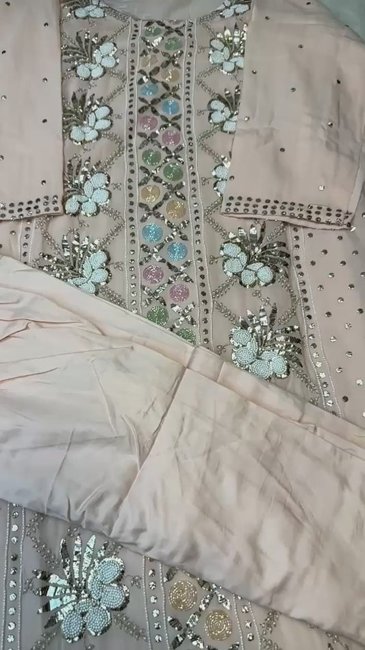 Baby pink  pure Viscose georgette Mukaish pitta and pearl handwork suit