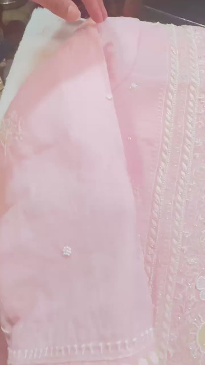 Baby pink  pure Mulmul Chikankari suit highlighted with hand chikankari and pearl handwork