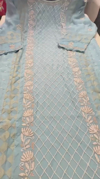 Sky blue pure Mulmul Pearl suit highlighted with and pearl & Cutdana handwork