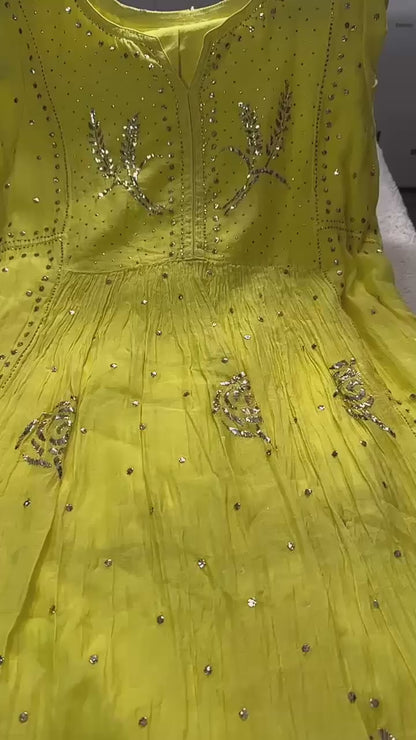 Sunshine Yellow Mulmul Chikankari gown suit highlighted with handwork Mukaish pitta
