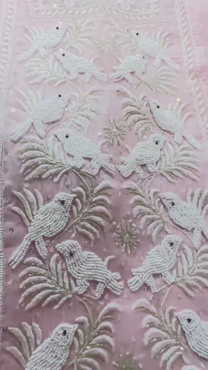 Baby pink  pure Mulmul Chikankari suit highlighted with hand chikankari and pearl handwork