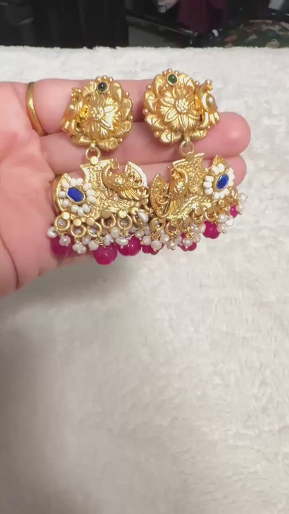 Pure 92.5 Silver Gold tone Peacock Earrings embellished with semiprecious Ruby beads & Blue lapis stone along with Fresh water pearls.