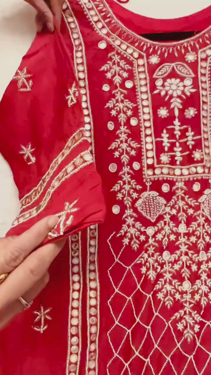 Red  pure Mulmul Pearl suit highlighted with and pearl & Cutdana handwork