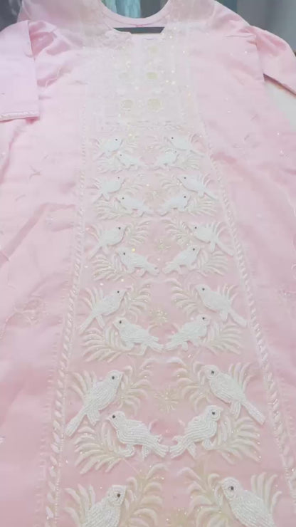 Baby pink  pure Mulmul Chikankari suit highlighted with hand chikankari and pearl handwork