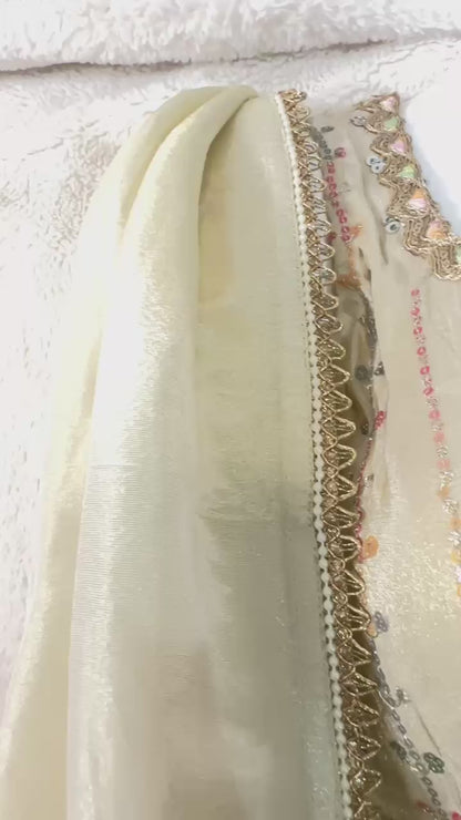 Beige Gold pure tissue silk designer Indowestern sharara set highlighted with sequins & Thread zari work